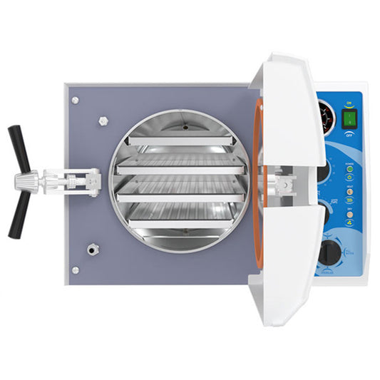 Tuttnauer 2540M Manual Autoclave, with Door Open, Displaying Chamber with Four Trays